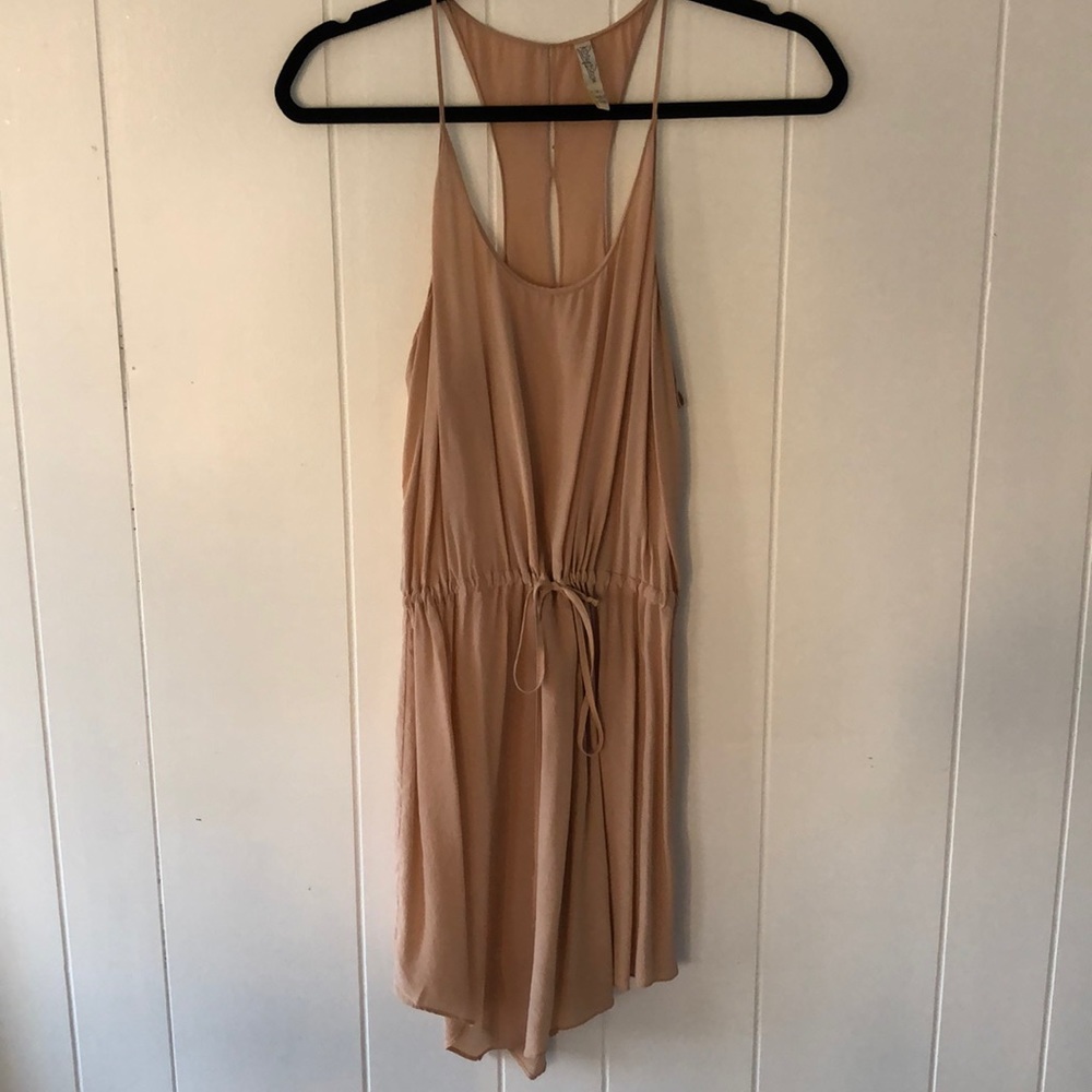 Light pink asymmetrical dress with open back